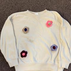 Svetr bloemen kind, jak nahlášeno Burgers' Zoo pomocí iLost