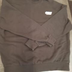 Trui zwart, zoals gemeld door Rotterdam The Hague Airport met iLost