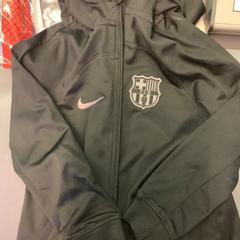 Kinderjas FC Barcelona, como reportado por Eindhoven Airport utilizando o iLost