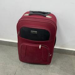 Wheeled suitcase سفر بعجلات احمر, as reported by محطة بريدة (بريدة) using iLost