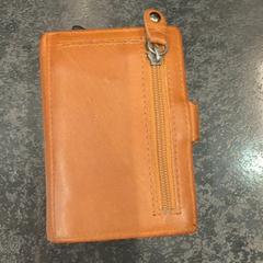 Lommebok, som rapportert av Rotterdam The Hague Airport ved bruk av iLost