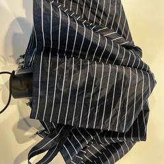 Regenschirm - zwart/wit, gemeldet von Centraal magazijn über iLost