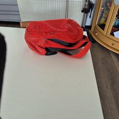 Rode rugzak, gerapporteerd met iLost