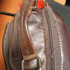 Tas marron, zoals gemeld door TCL met iLost
