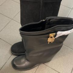 Bottes, a été signalé par Inntel Hotels Amsterdam Centre utilisant iLost