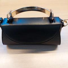 Håndveske, som rapportert av Regio Limburg - Leuven ved bruk av iLost