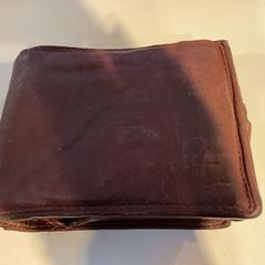 Lommebok Op naam van wolveren, som rapportert av Gemeente Amsterdam ved bruk av iLost