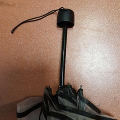 Hopfällbart paraply transparent et noir, rapporterat av TCL med iLost