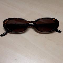 Occhiali da sole, come riportato da Arriva Oost-Brabant utilizzando iLost