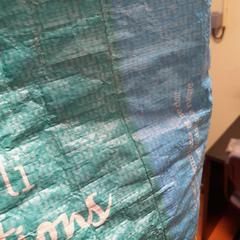 Saco de course vert et bleu, como reportado por TCL utilizando o iLost