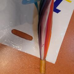 Deštník multicolore, jak nahlášeno TCL pomocí iLost