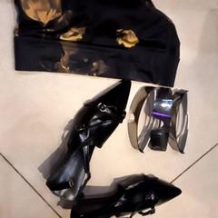 Heels,sunglasses,sports bra, zoals gemeld door Leonardo Royal Hotel Amsterdam met iLost