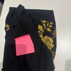 T shirt, zoals gemeld door Amsterdam ID Aparthotel met iLost