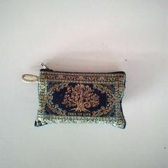 Porte-monnaie, come riportato da Twisto utilizzando iLost