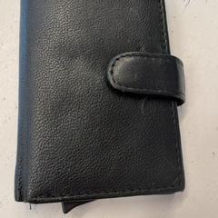 Plånböcker Cao, rapporterat av HTM med iLost