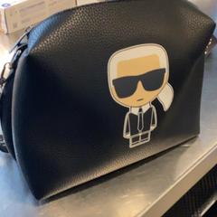 Saco Lagerfeld, como reportado por MEININGER Hotel Leipzig Hauptbahnhof utilizando o iLost