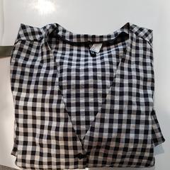 Blouse Zwart wit geblokt, zgłoszono przez Zwarte Cross (Gemeentehuis) przy użyciu iLost