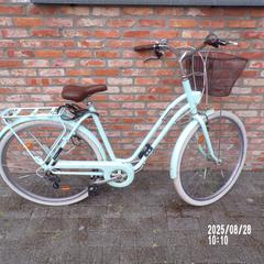 Bicicleta groen pastel, Btwin, mandje, ha sido reportado por Fietsdepot Leopoldsburg con iLost