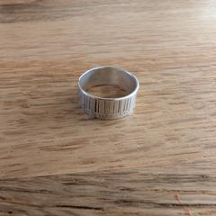 Zilveren barcode ring، كما تم الإبلاغ عنه عبر iLost
