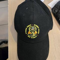 Cap Cobra Kai, as reported by Centraal magazijn using iLost
