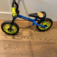 Children's bike Blauw met groen, as reported by Designer Outlet Roosendaal using iLost