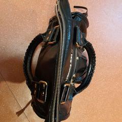 Sac à main noir, a été signalé par TCL utilisant iLost