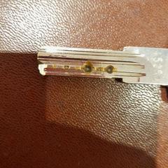 Chave clé avec badge, como reportado por TCL utilizando o iLost