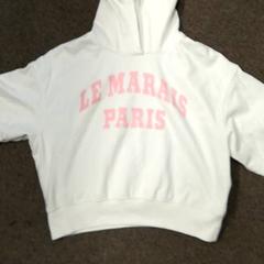 Pull Wit met roze letters, a été signalé par Burgers' Zoo utilisant iLost