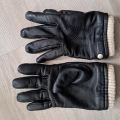 Zwarte handschoenen, gerapporteerd met iLost