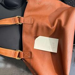 Sac bruin, a été signalé par Gemeente Ermelo utilisant iLost