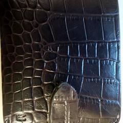 Carteira - MENGA, como reportado por Centraal magazijn utilizando o iLost