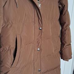 Een bruine winterjas a été signalé sur iLost