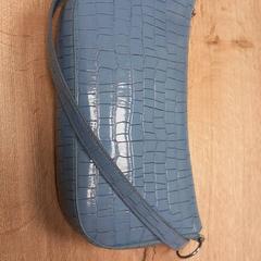 Blauw damestasje, jak nahlášeno Pouw Vervoer pomocí iLost