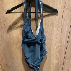 Fürdőruha, amint azt Van der Valk Hotel Apeldoorn - De Cantharel az iLost segítségével jelentette.