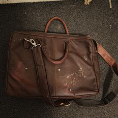 Leren laptoptas bruin, iLost'a bildirildiği gibi