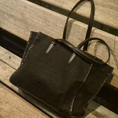 Zwarte handtas, som rapporterats till iLost