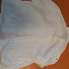 Corsage blanc, como reportado por TCL utilizando o iLost