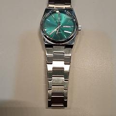 Orologio da polso Silver, come riportato da MEININGER Hotel Munich Olympiapark utilizzando iLost