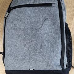 Rugtas Grijs, merk Puma، كما تم الإبلاغ عنه بواسطة Connexxion Haarlem AML عبر iLost