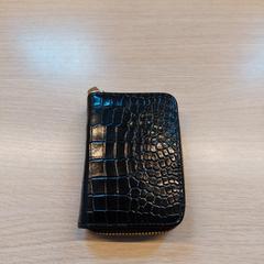 Porte-cartes Bissala Ninlong, a été signalé par Centraal magazijn utilisant iLost