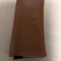 Estuche para lentes Bruin, segundo informou Centraal magazijn usando iLost