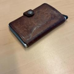 Pasjeshouder, rapporterat av RET med iLost