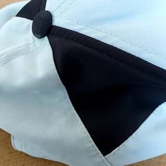 Kleding - Pet wit zwart, gemeldet von Centraal magazijn über iLost