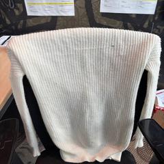 Kleding wite trui, rapporterat av Haven Hotel Rotterdam med iLost