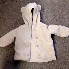 Vestje Beige met capuchon, rapporterat av Burgers' Zoo med iLost