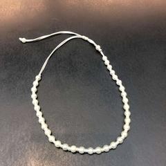 Armband wit, zoals gemeld door Universiteit Gent - Faculteitsbibliotheek LW met iLost