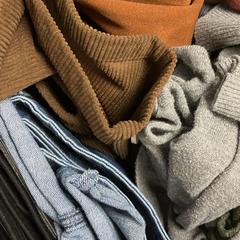 Roupa, como reportado por Sheraton Brussels Airport Hotel utilizando o iLost