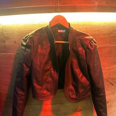 Jacket black leather, as reported by Club Nyx/Exit Café using iLost