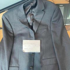 Blazer blue checkered blazer, som rapportert av Haven Hotel Rotterdam ved bruk av iLost