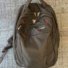 Rugzak Zwarte American Tourister, ako bolo nahlásené Connexxion Amstelland-Meerlanden Schiphol Zuid pomocou iLost